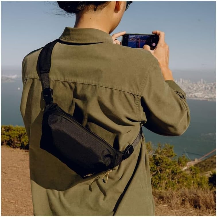 imagePeak Design Outdoor Sling 7L Kelp Padded Adjustable Shoulder Strap for Crossbody or Waist Carry 10 Pockets Ideal for Carrying Cameras and Essentials Versatile Sling Bag for Men and WomenBlack
