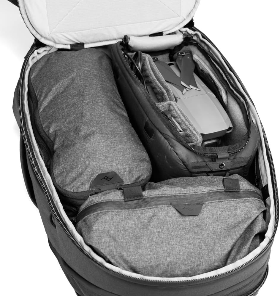 image:imagePeak Design Travel Backpack 30L Black Expandable 2733L Design Rear and Top Access Weatherproof Shell Laptop Sleeve Ideal for Travel or Everyday Carry Versatile Backpack for Men and WomenBlack